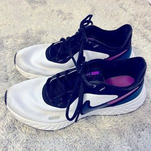 Nike Women’s Running shoes. Black with blue and maroon accents.